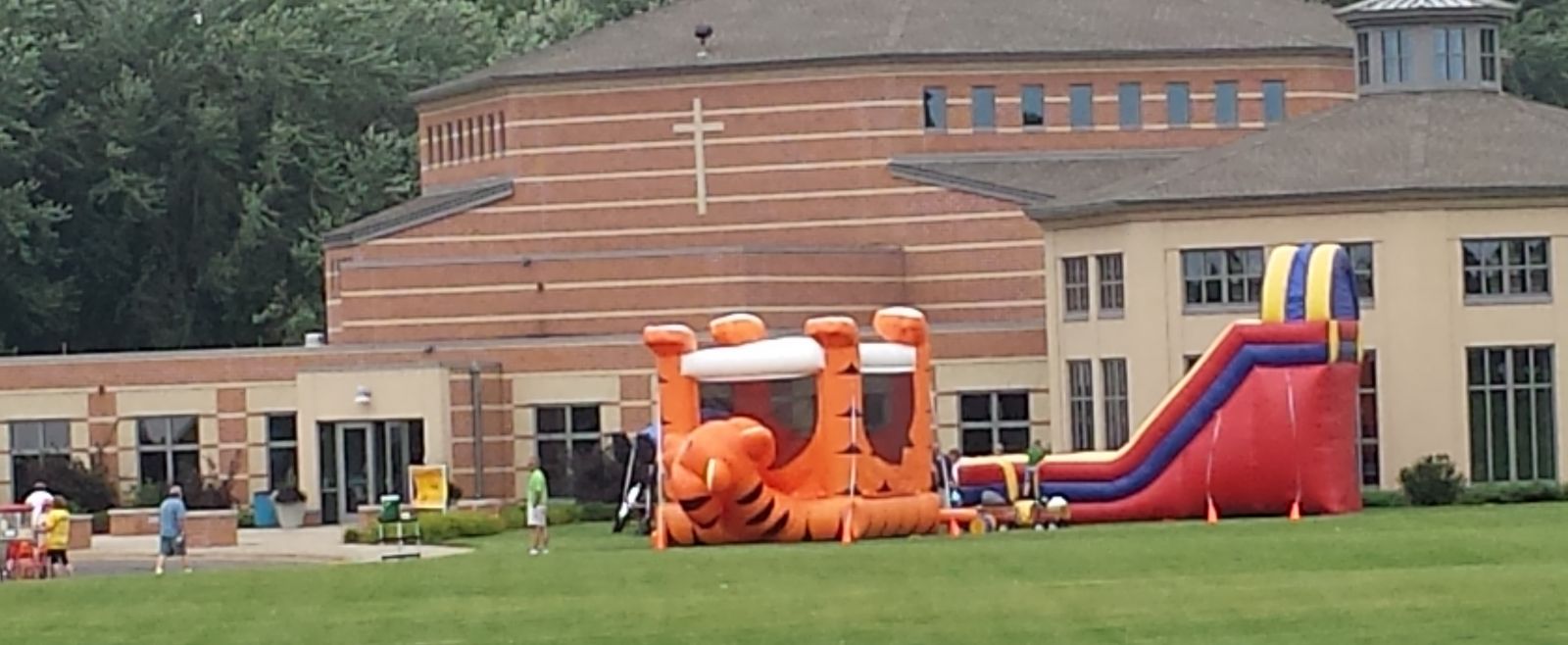 Tiger Belly Bouncer and 18' GIANT Dry Slide in front of church
